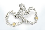 Gold & Silver bracelet, scale dragon chain round 6mm, spring lock with 18K gold hammer motif and white topaz pave stones